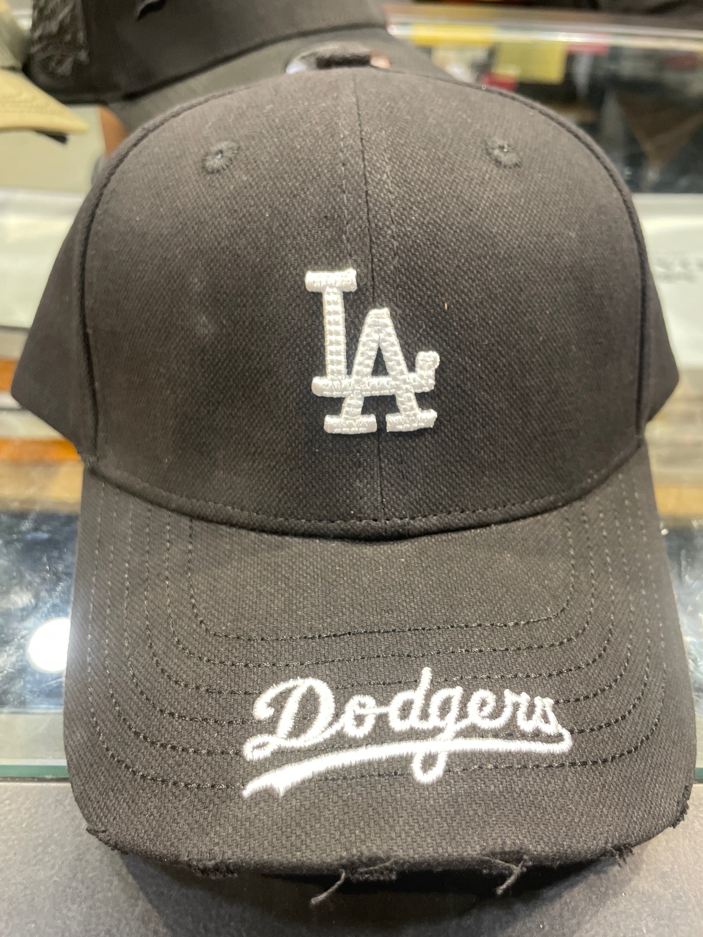 LA Black Colour White Embroidery Rugged Imported Cap 990790