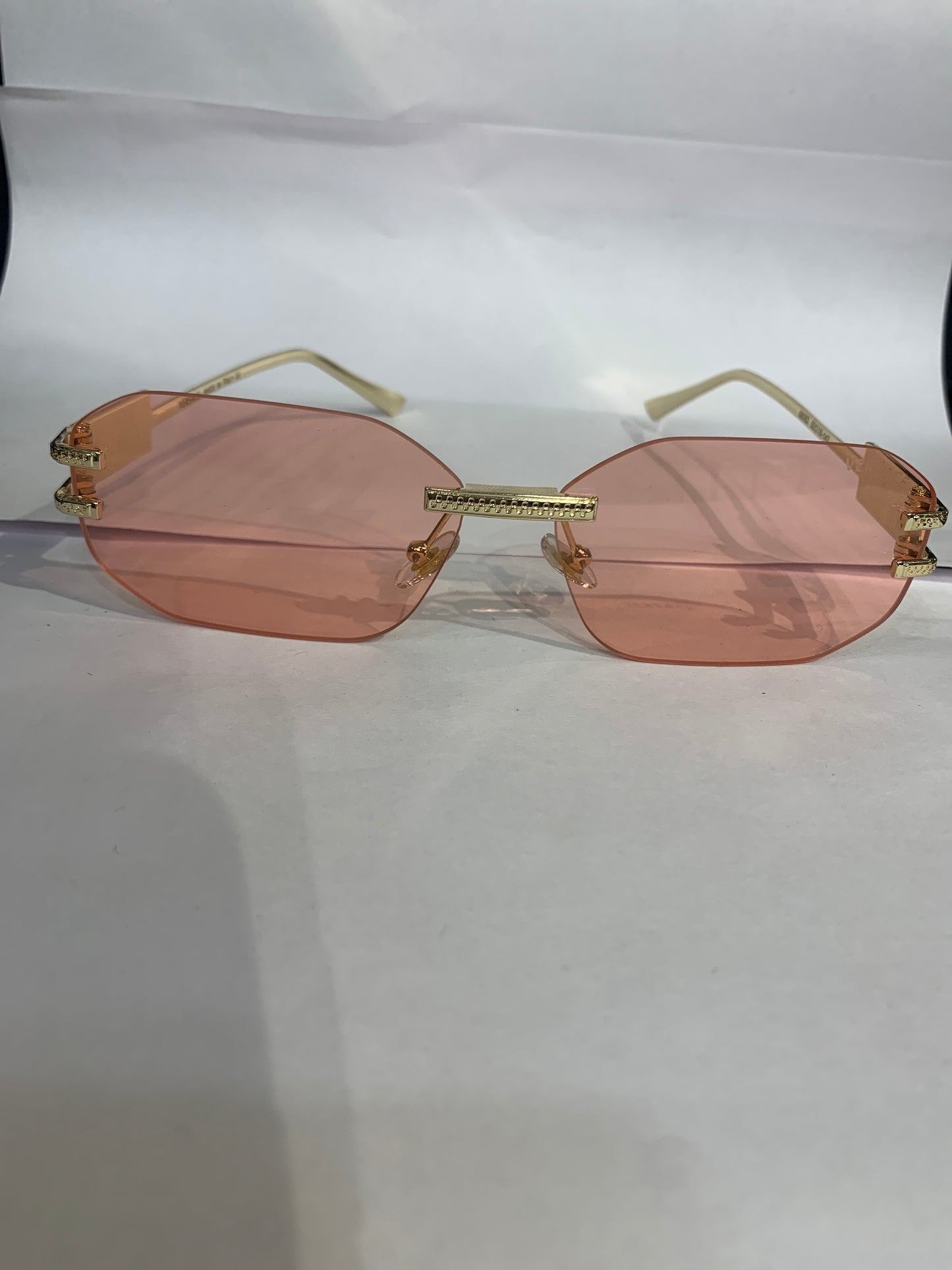 REV Frameless Golden Stike Peach Shade Unisex Sunglasses 68082 52 18 142