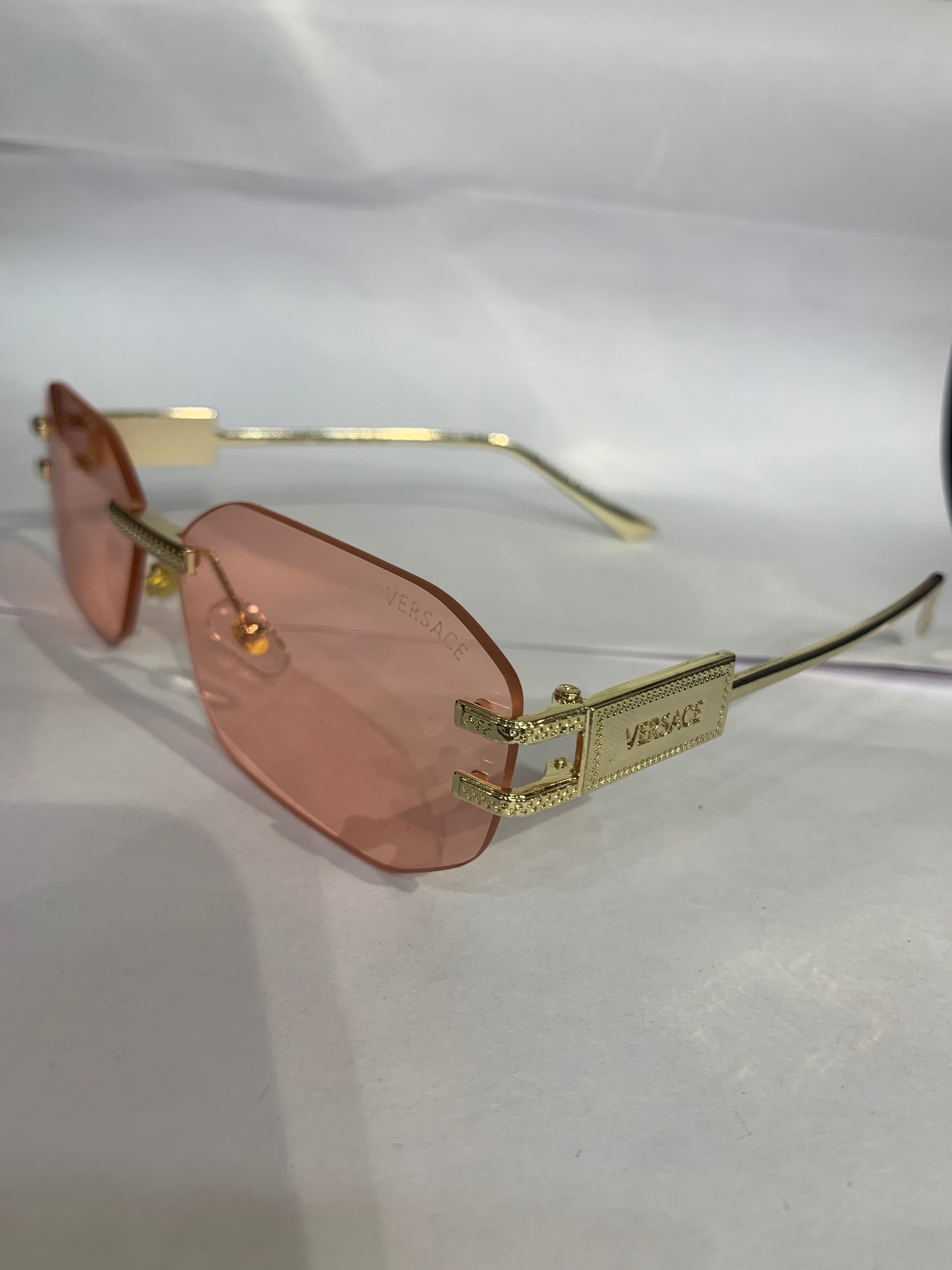REV Frameless Golden Stike Peach Shade Unisex Sunglasses 68082 52 18 142