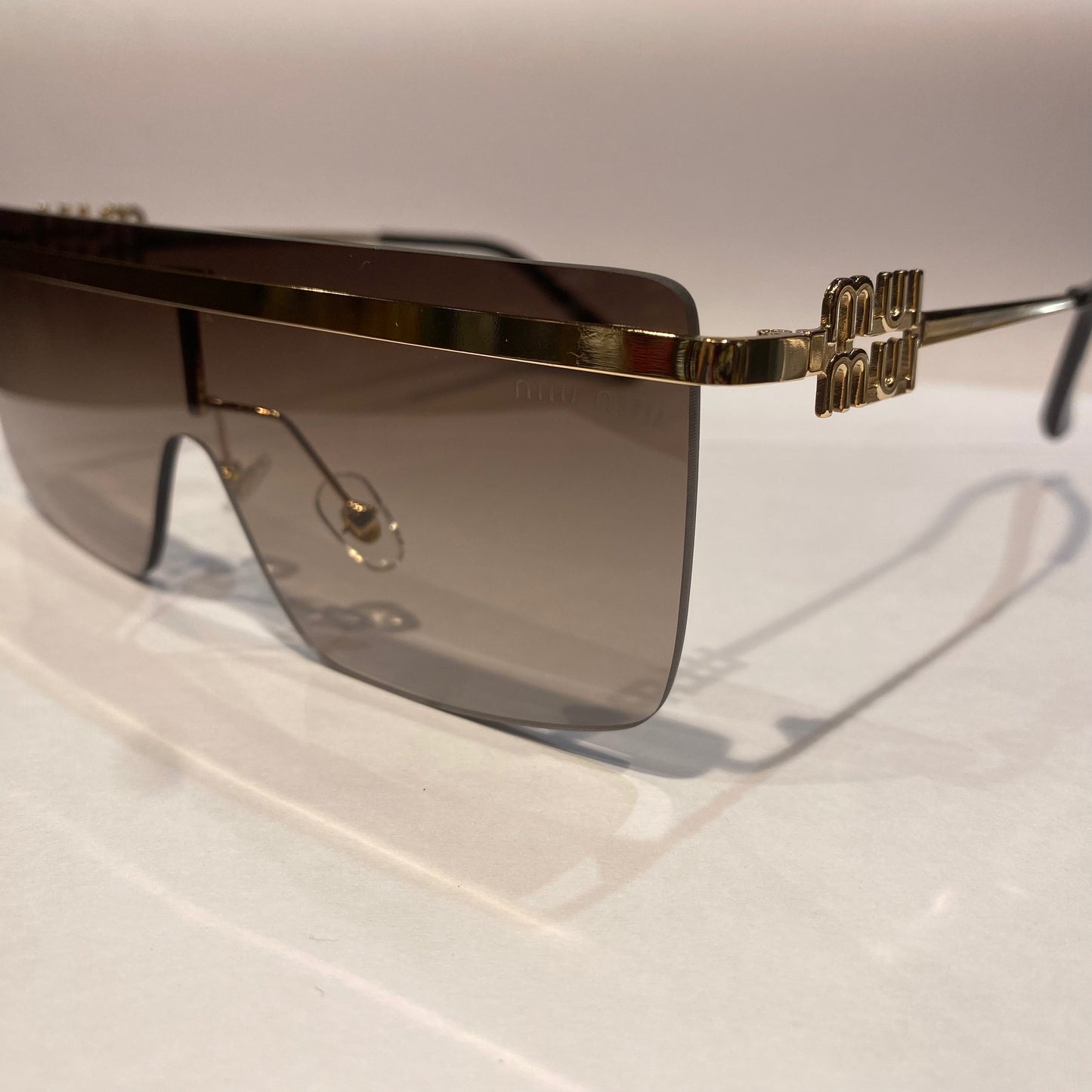 UIM Frameless Brown Trancy Shade Silver Copper Stick Unisex Sunglasses 98234 52 15 143