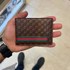 CUG Brown colour With Green Strip Italian Leather Men’s Wallet’s 988789