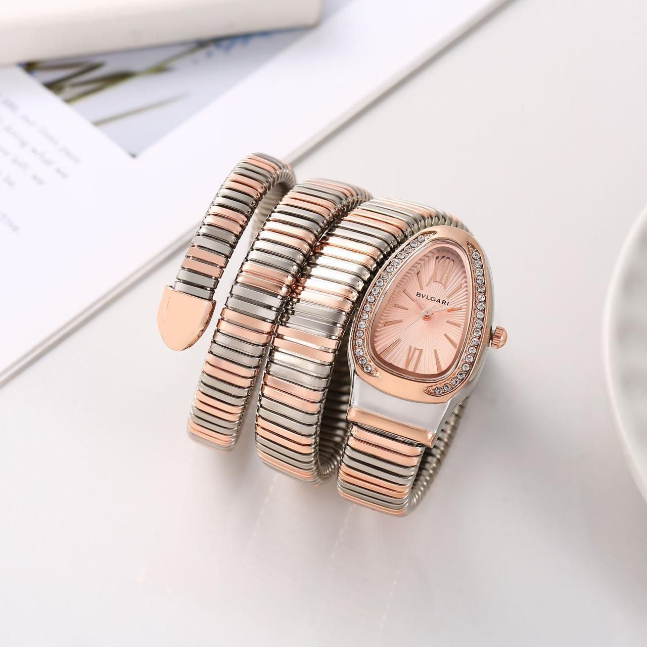 LVB Copper Silver Snake Chain Ladies Stud Peach Dial Watch 989352