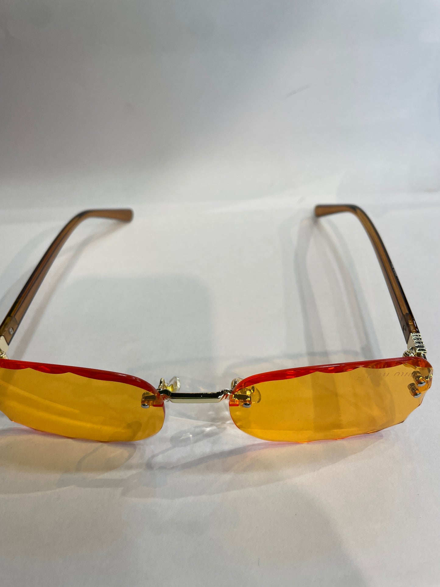 UIM MIU Brown Stick Frameless Orange Shade Unisex Sunglass SUN2031