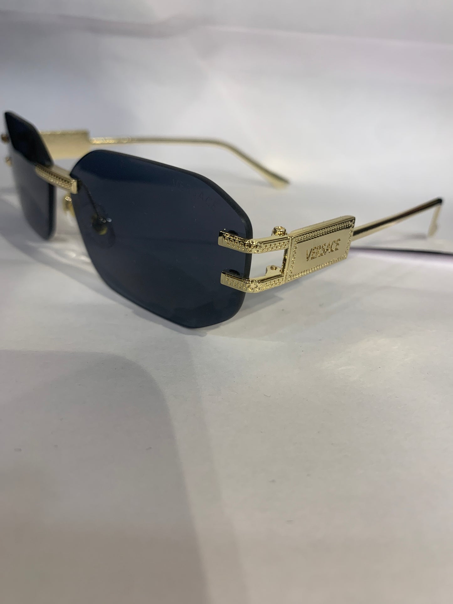 REV Frameless Golden Stike Black  Shade Unisex Sunglasses 68082 52 18 142
