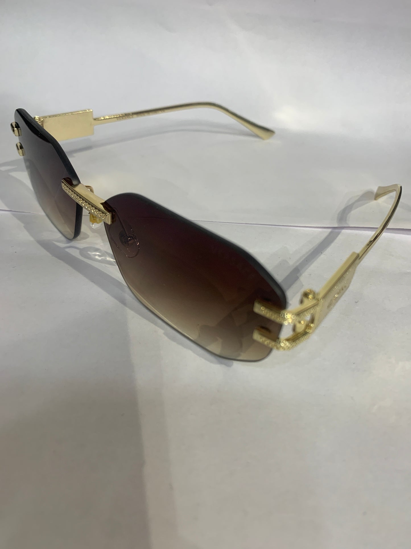 REV Frameless Golden Stike Brown Shade Unisex Sunglasses 68082 52 18 142