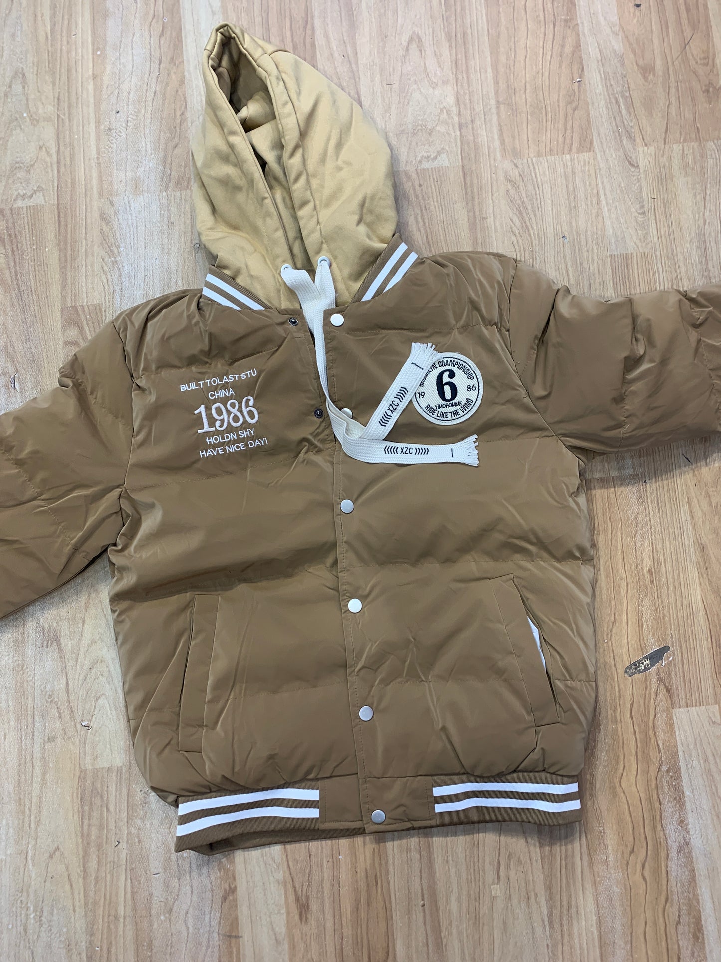1986 Brown Colour With Crarame Embroidery Design Premium Quality Varsity Jacket 67719