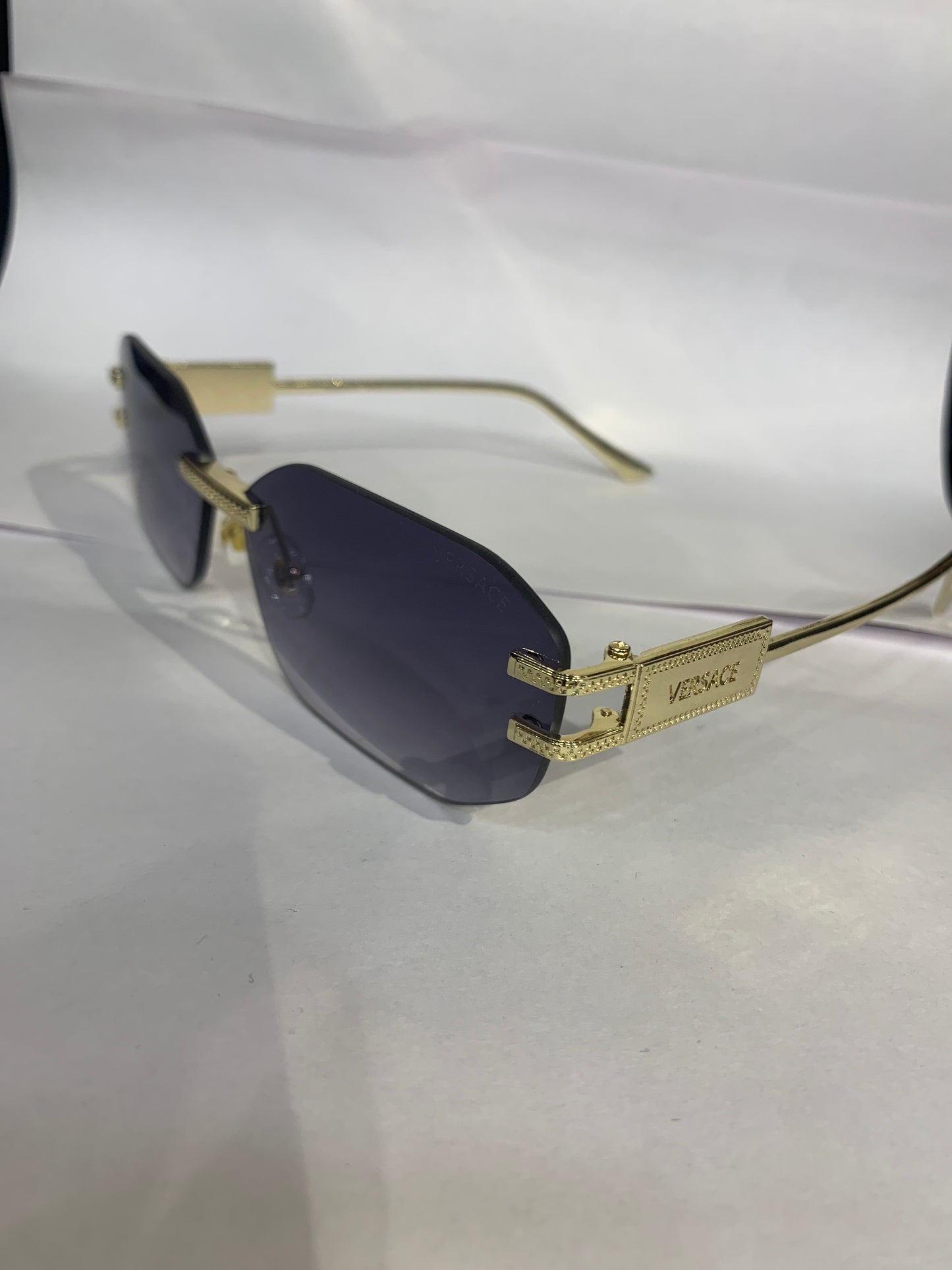 REV Frameless Golden Stike Blackish Trancy Shade Unisex Sunglasses 68082 52 18 142