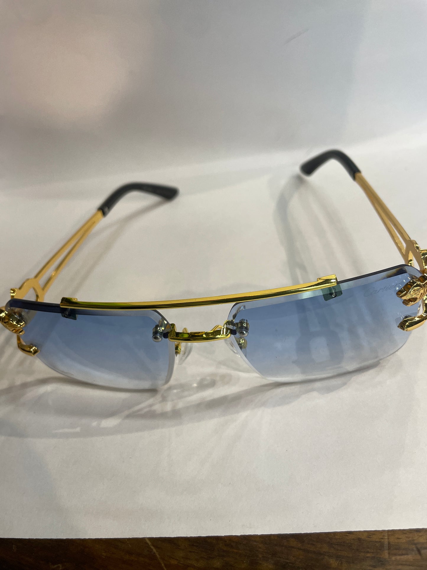RAC Frameless Golden Black Stick Trancy Blue Shade Sunglass SUN 2034