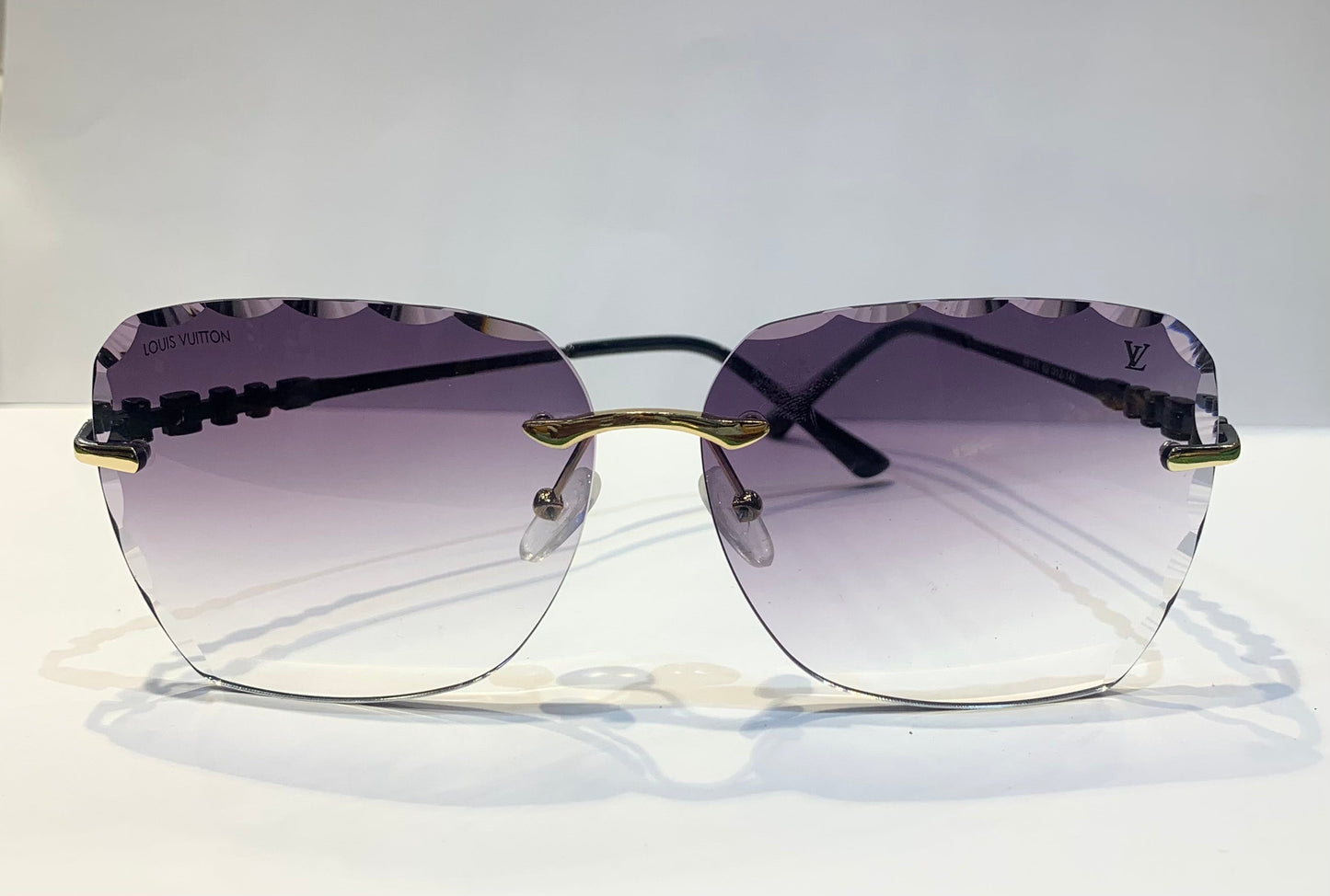 UOL VL Black Frame Purple Shade Unisex Sunglass 68111 62 12 142