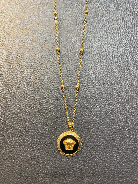 REV VER Gold Black Colour Pendant 987634