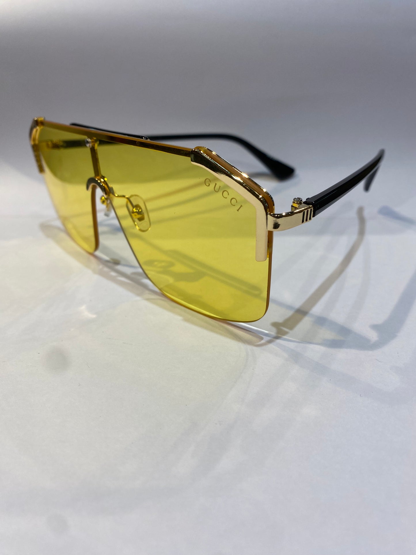 CUG Gold Black Frame Yellow Shade Unisex Sunglasses 0291 135 0 145
