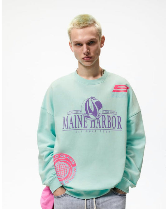 Zr C Round neck sweatshirt with long sleeves. Contrast all-over graphic prints. Ribbed trims. Sea green